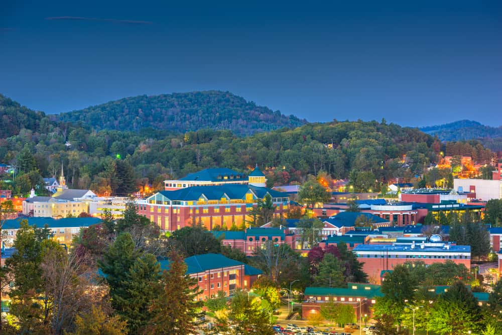 This is a nighttime aerial view of the town skyline of Boone.