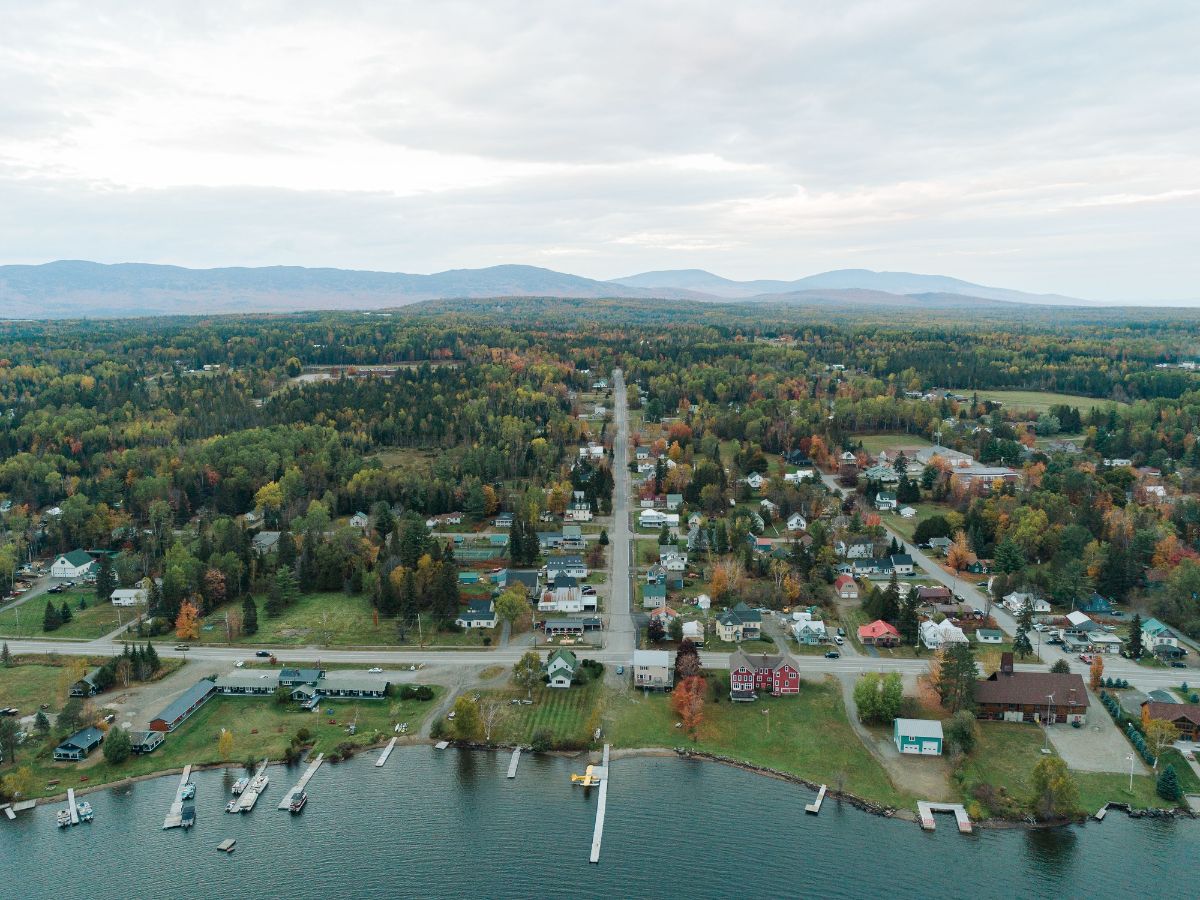 A town near a lake shore in Rangeley Maine.