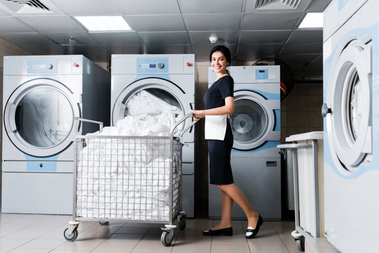 A woman doing a hotel laundry.