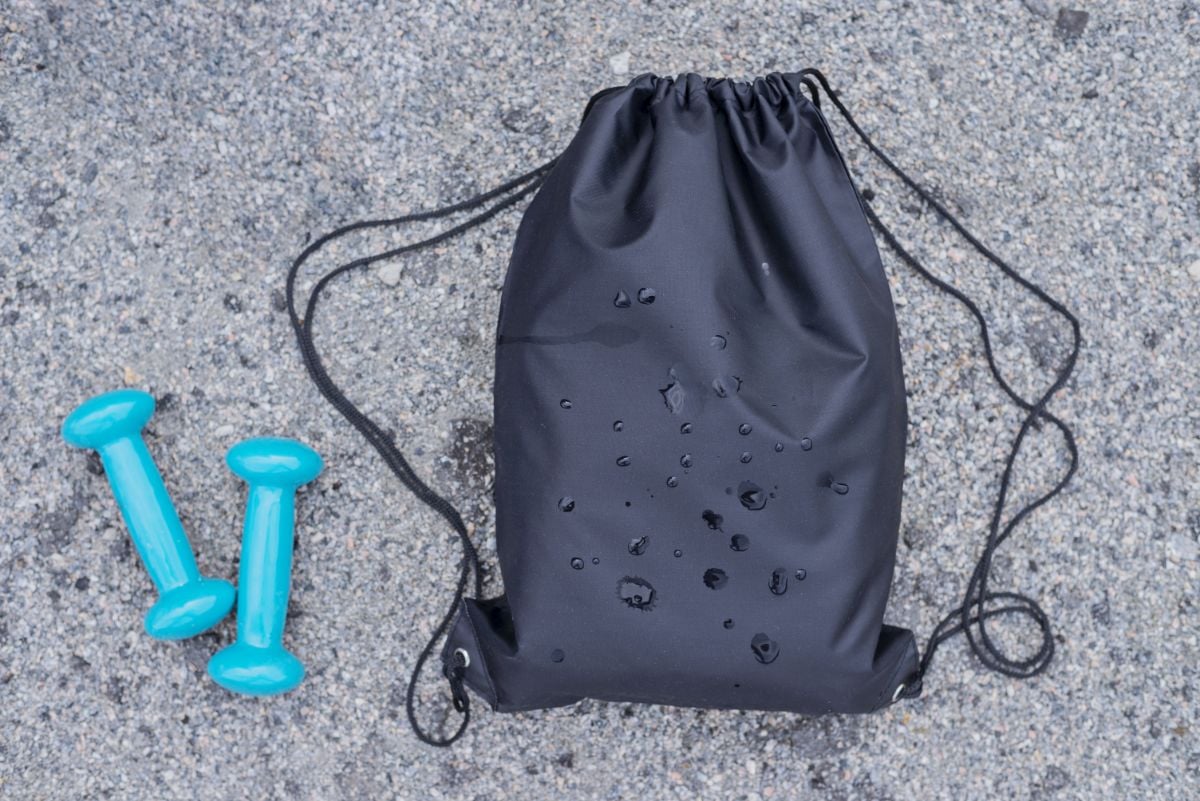 Drawstring Gym Sacks and two weights. 