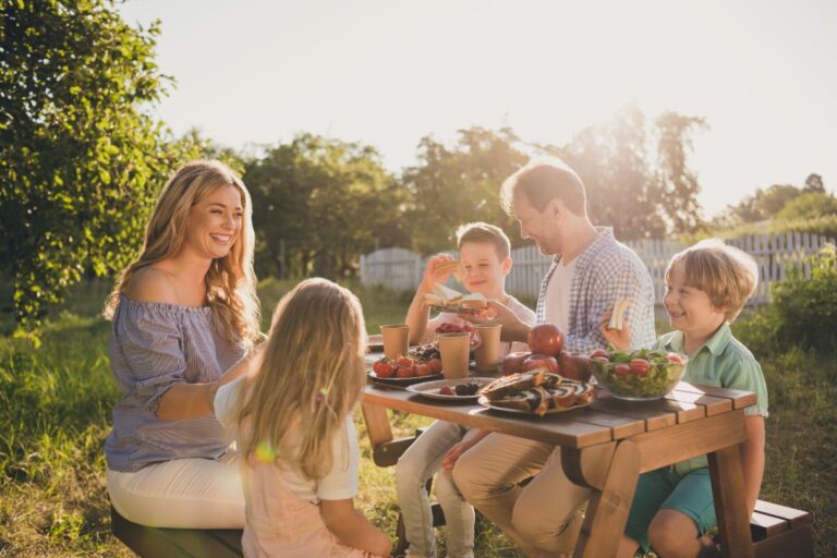 A family enjoying a picnic on a sunny day.