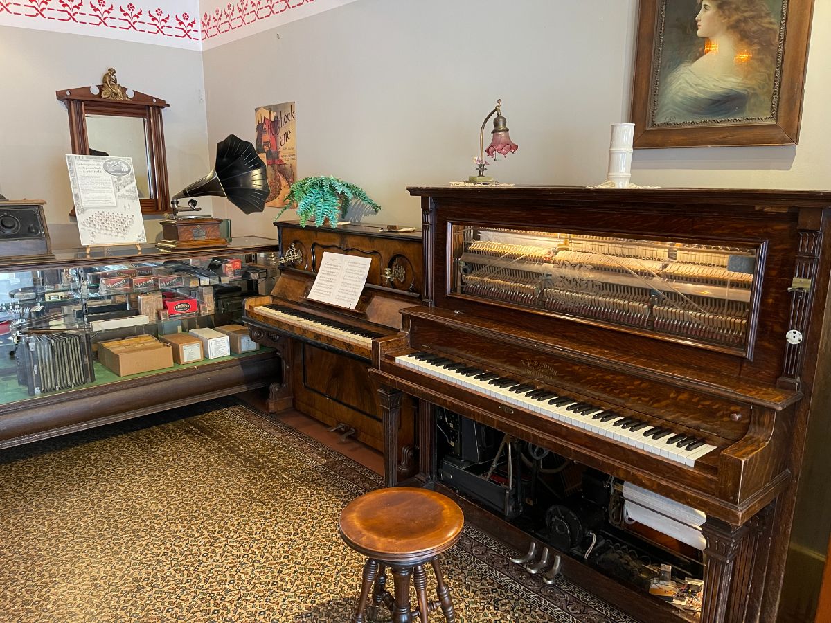 Pianos for sale in 1920s music store at Burnaby Village Museum