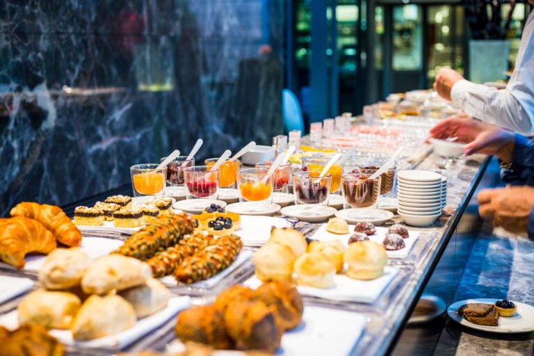 Hotel breakfast presented on a buffet.