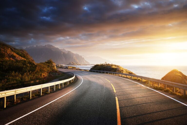 Beautiful open highway going into the sunset for a roadtrip