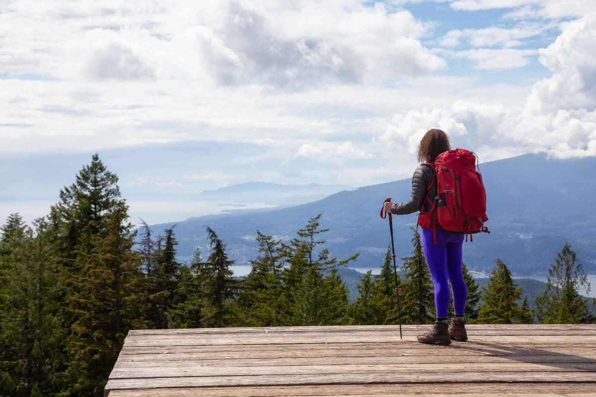 female hiker on top of mount gardner on bowen island in BC