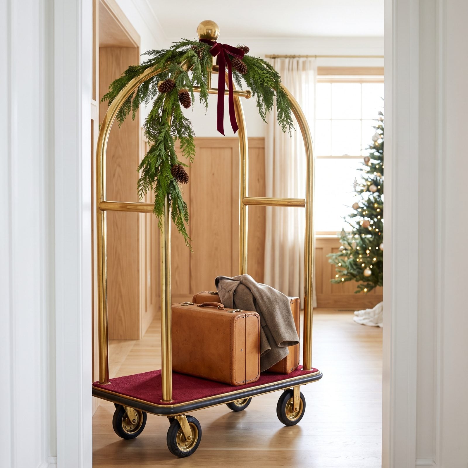 A Brass Luggage Cart Decorated With Real Greenery