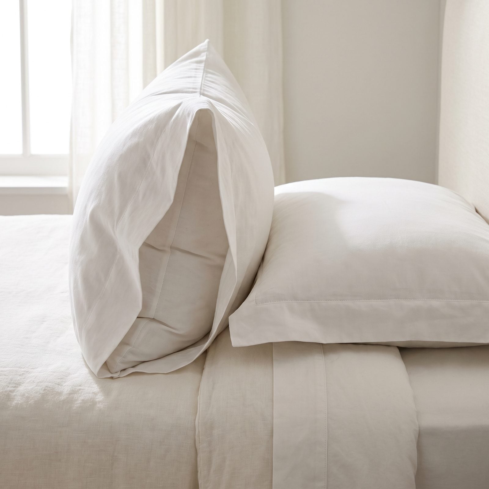Fold a Thin Pillow Inside Its Case to Double the Loft