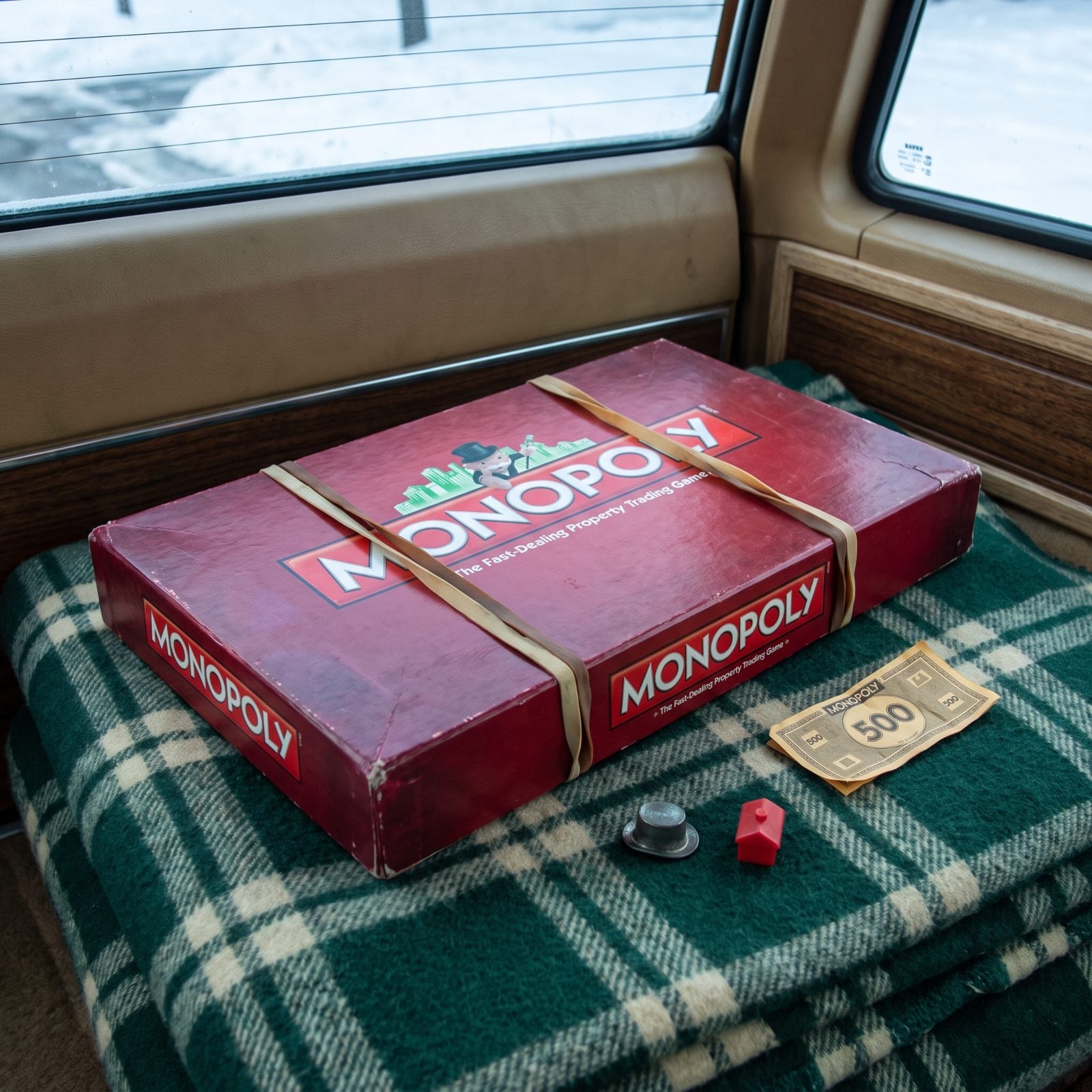 The Full-Size Monopoly Box Held Shut With Rubber Bands