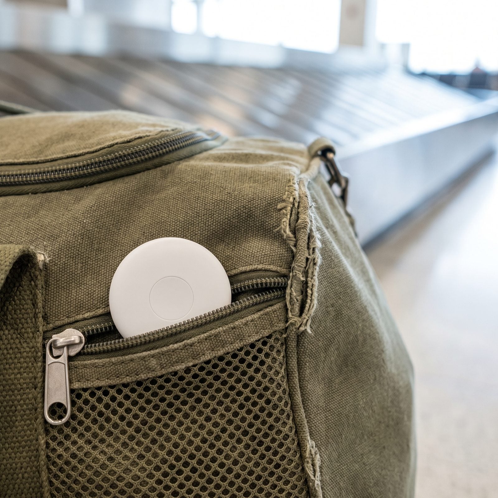 Hiding a Tracker in an Outer Pocket That Can Tear Away