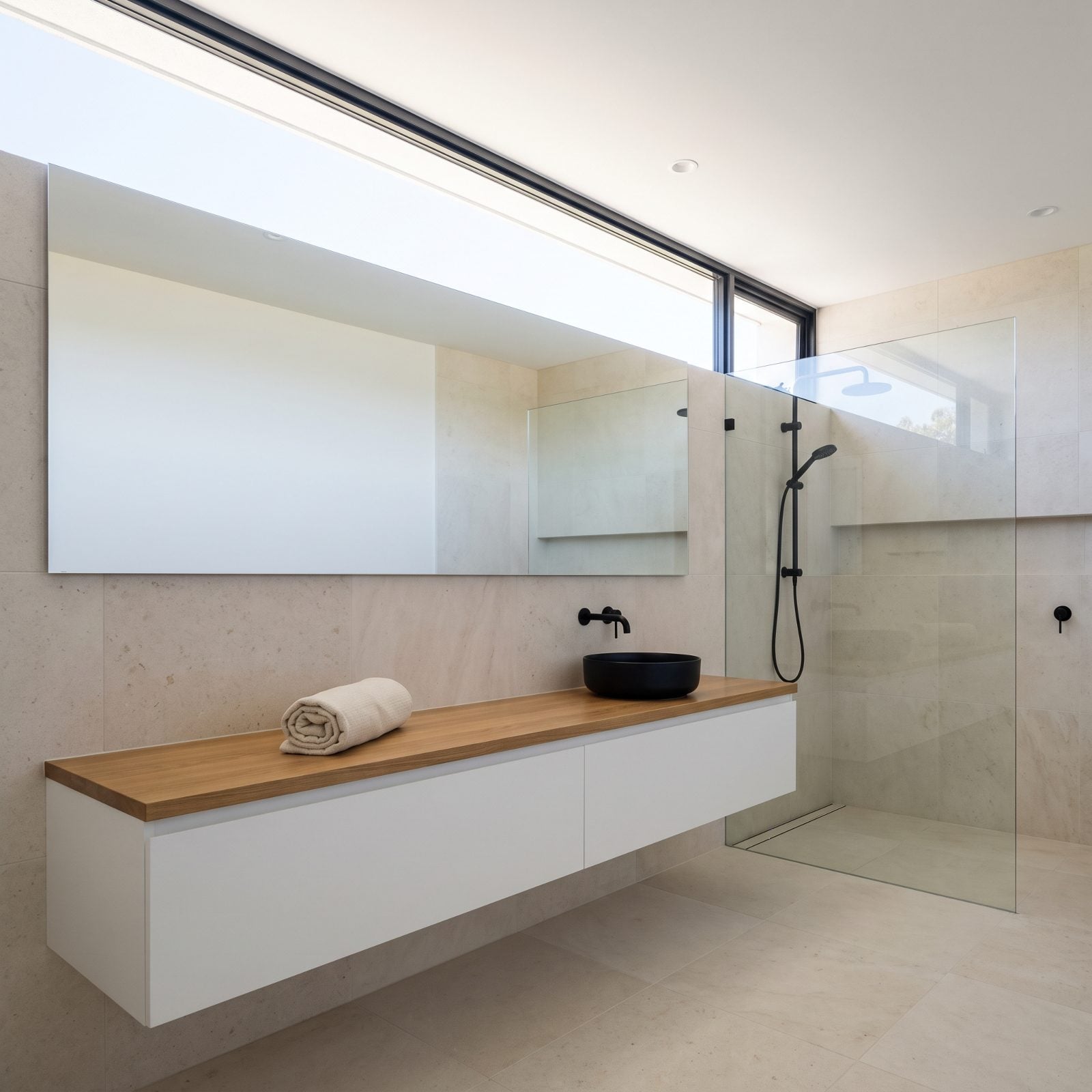 A High Clerestory Window Leaves Walls Free for Fixtures