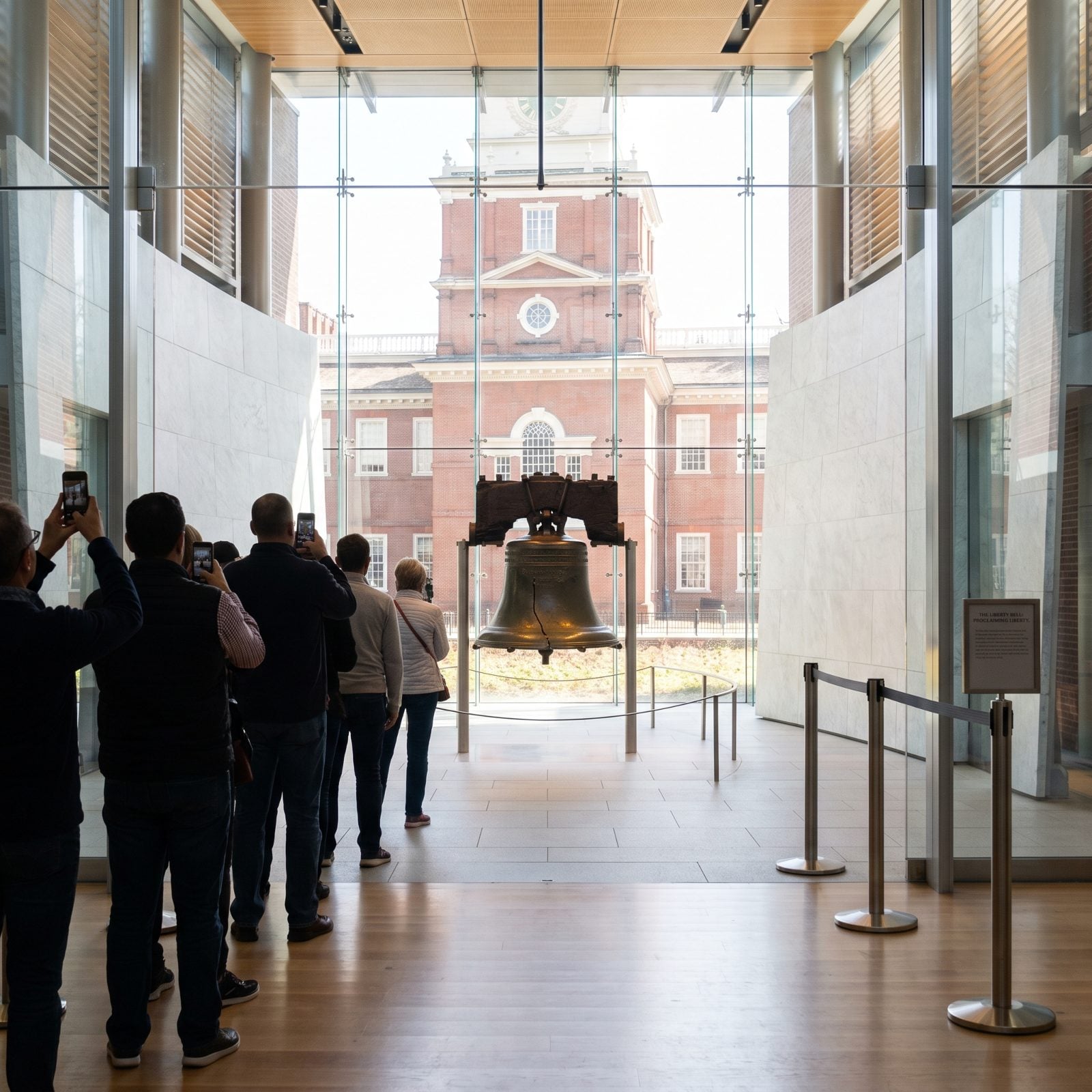 The Liberty Bell Is Displayed Inside a Modern Glass Pavilion