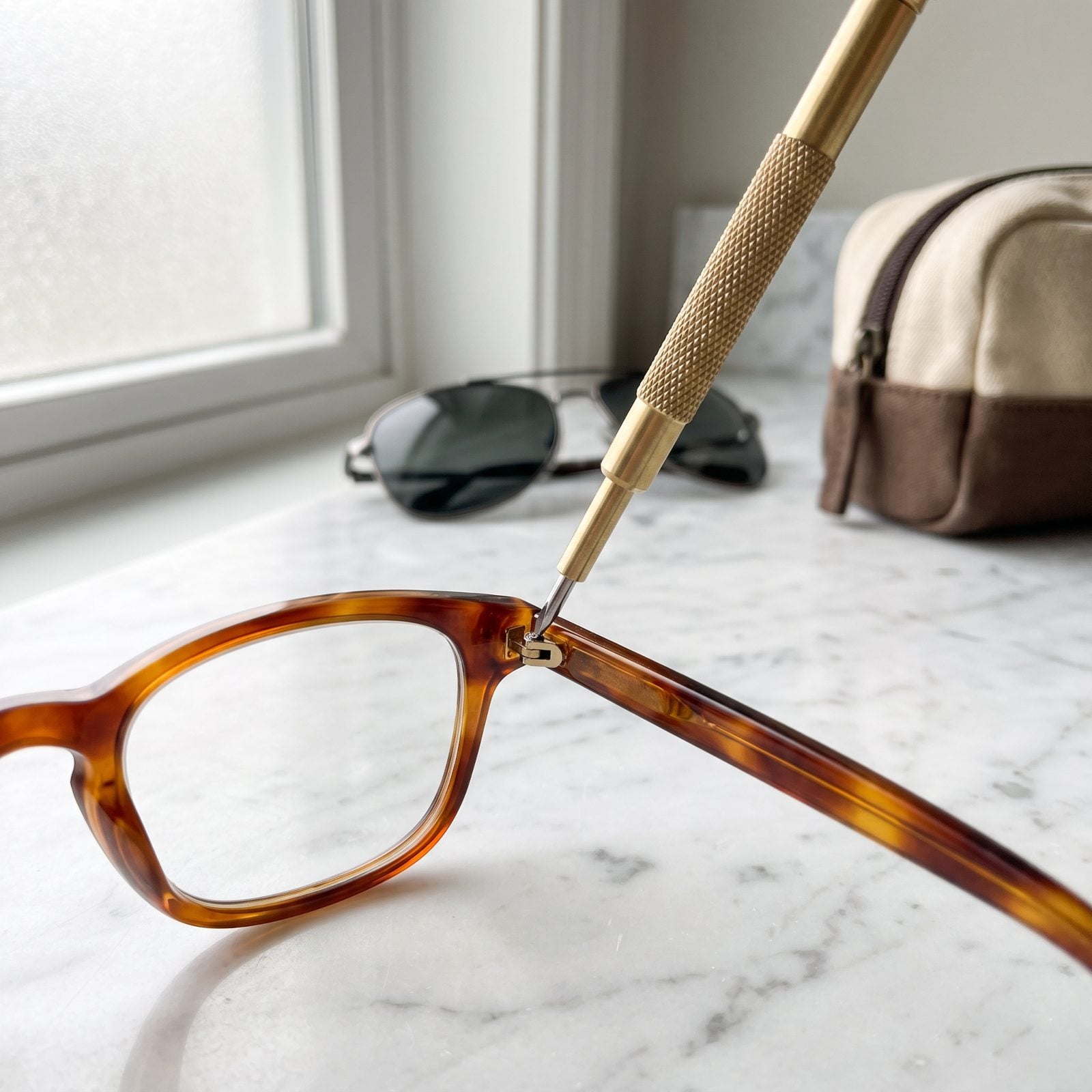 A Mini Eyeglass Screwdriver for the Screw You'll Lose at the Worst Time