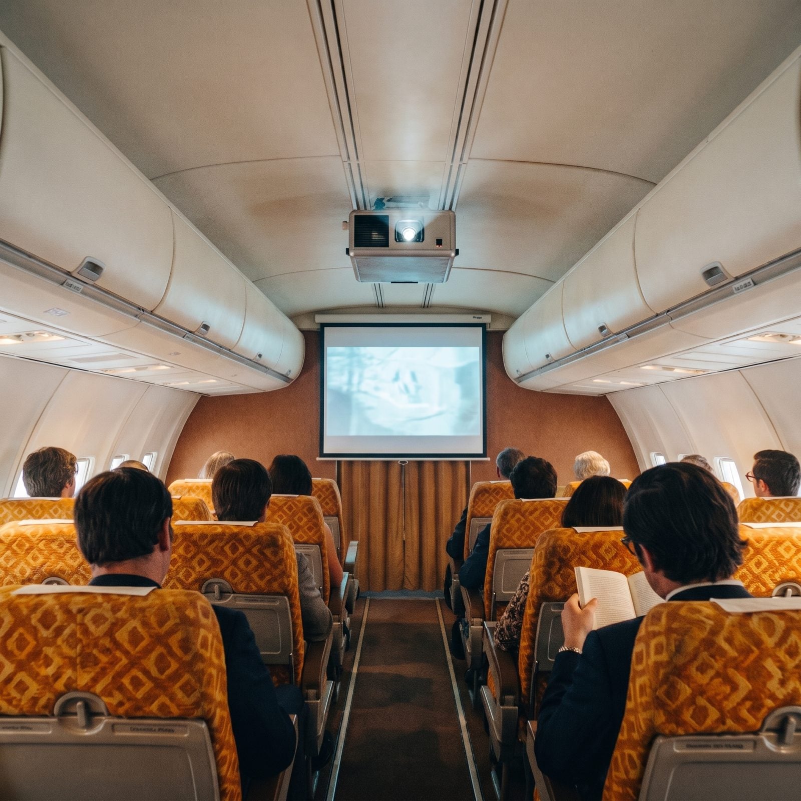 One Movie Screen for the Whole Cabin, Projected Onto the Bulkhead