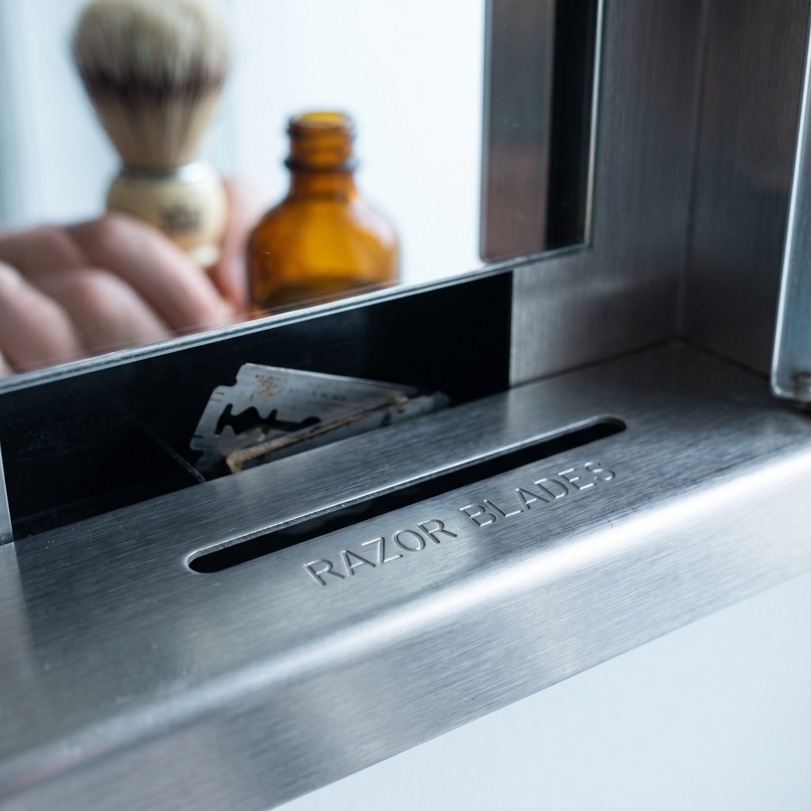 The Razor-Blade Disposal Slot Hiding in the Medicine Cabinet