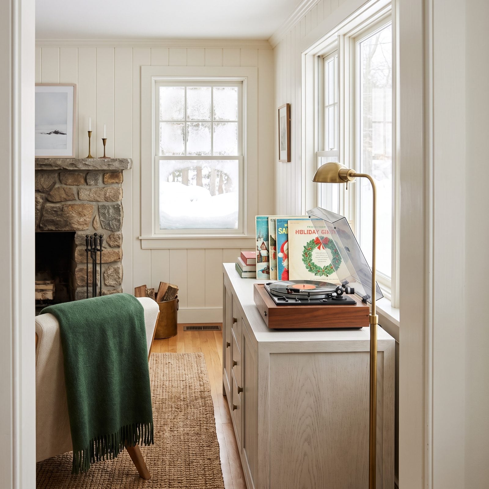 A Record Player With Holiday Albums on Display