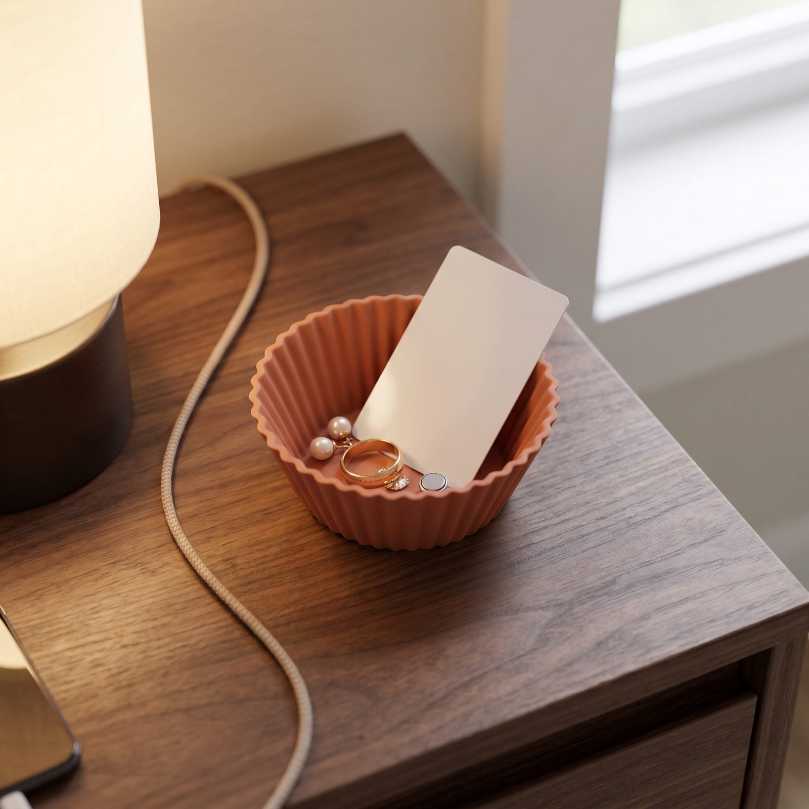 A Silicone Baking Cup as a Bedside Catchall
