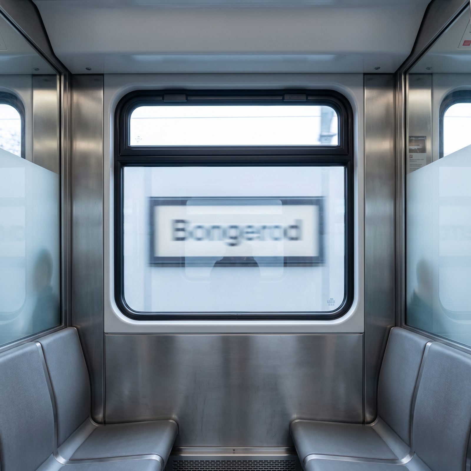Sitting Where Station Names Remain Visible
