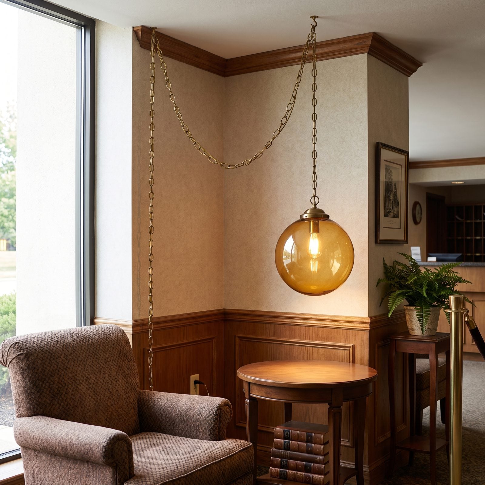 The Swag Lamp Dangling From a Chain in the Corner