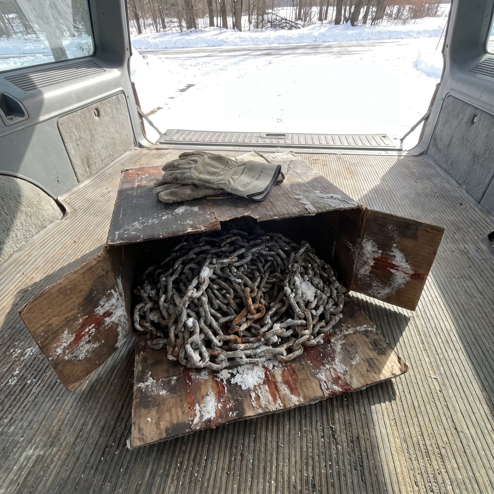 The Tire-Chain Box Crusted in Road Salt